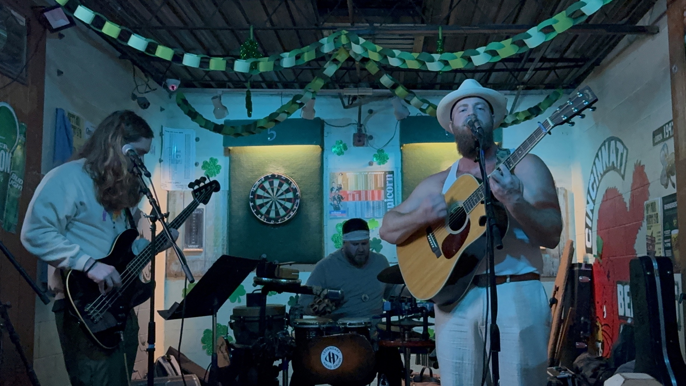 The Rusty Halos playing a Cincinnati room — Joe, Ryan, and Tommy on a small stage